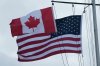 Flags of Canada and the United States are shown in San Francisco, Friday, Oct. 10, 2025. (AP Photo/Jeff Chiu)