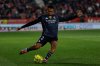 Real Madrid's Trent Alexander-Arnold kicks the ball during a Spanish La Liga soccer match between Girona and Real Madrid, in Girona, Spain, Sunday, Nov. 30, 2025. (AP Photo/Joan Monfort)