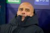 Manchester City's head coach Pep Guardiola sits in the dug out ahead of the Champions League opening phase soccer match between Manchester City and Bayer Leverkusen in Manchester, England, Tuesday, Nov. 25, 2025. (AP Photo/Dave Thompson)