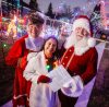JOHN WOODS / WINNIPEG FREE PRESS
Brad and Roxanne Wallace, dressed as Santa and Mrs Claus, are photographed with city councillor Devi Sharma who assisted them in getting a permit for their Christmas light display that arches over the city sidewalk in front of their home in Winnipeg, Tuesday, November 25, 2025.

reporter: kevin