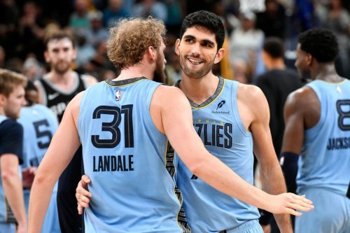 Memphis Grizzlies center Jock Landale (31) and forward Santi Aldama celebrate after defeating the San Antonio Spurs in an NBA basketball game Tuesday, Jan. 6, 2026, in Memphis, Tenn. (AP Photo/Brandon Dill)
