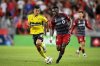 Toronto FC midfielder Derrick Etienne (right) moves the ball forward while chased by Columbus Crew defender Andres Herrera (2), during first half MLS soccer action, in Toronto on Wednesday, September 18, 2024. THE CANADIAN PRESS/Chris Katsarov