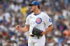 FILE - Chicago Cubs closing pitcher Brad Keller celebrates after the Cubs defeating the Pittsburgh Pirates in a baseball game, Aug. 16, 2025, in Chicago. (AP Photo/Paul Beaty, File)