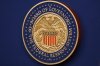 The Federal Reserve Chair logo appears on a podium at the Federal Reserve, Wednesday, Dec. 10, 2025, in Washington. (AP Photo/Jacquelyn Martin)