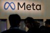FILE - Attendees visit the Meta booth at the Game Developers Conference 2023 in San Francisco on March 22, 2023. (AP Photo/Jeff Chiu, File)