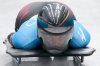 FILE - Janine Flock, of Austria, slides during the women's skeleton run 3 at the 2022 Winter Olympics, Saturday, Feb. 12, 2022, in the Yanqing district of Beijing. (AP Photo/Dmitri Lovetsky, File)