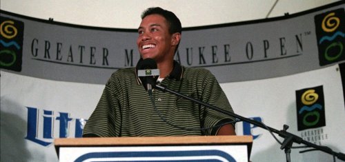FILE - Tiger Woods answers questions at a news conference following play in the pro-am at the Greater Milwaukee Open Wednesday, Aug. 28, 1996, at the Brown Deer Golf Course, in Milwaukee. (AP Photo/Peter Zuzga, File)