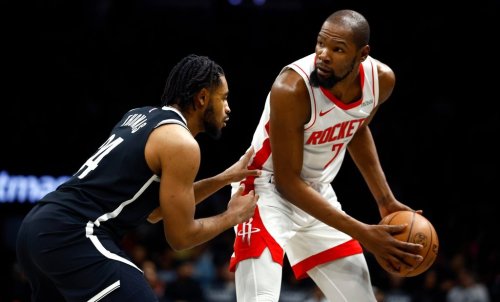 Houston Rockets forward Kevin Durant (7) handles the ball against Brooklyn Nets guard Cam Thomas, left, during the first half of an NBA basketball game, Thursday, Jan. 1, 2026, in New York. (AP Photo/Noah K. Murray)