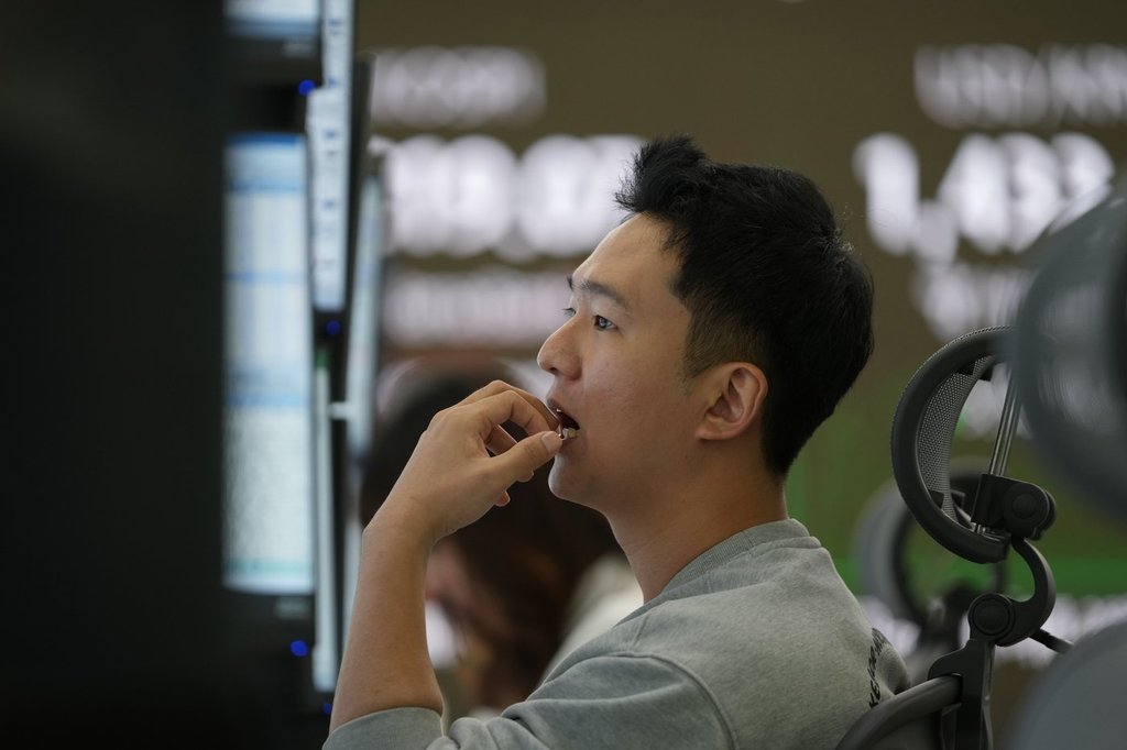 Asian shares follow Wall Street lower in final stretch of 2025