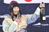 FILE - Gold medalist Chloe Kim of USA reacts on the podium after the Women's Snowboard Halfpipe competition at the FIS Snowboard, Freestyle and Freeski World Championships in St. Moritz, Switzerland, Saturday, March 29, 2025. (Gian Ehrenzeller/Keystone via AP, File)
