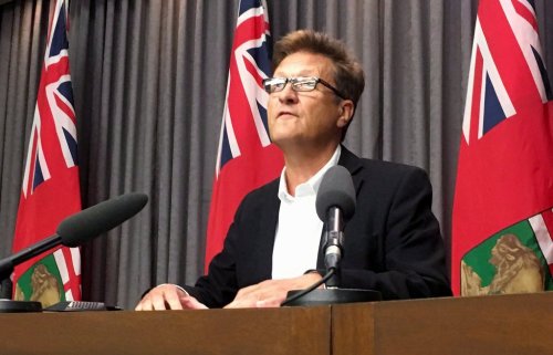 Manitoba Infrastructure Minister Ron Schuler speaks to media in Winnipeg on Thursday, July 26, 2018. THE CANADIAN PRESS/Steve Lambert