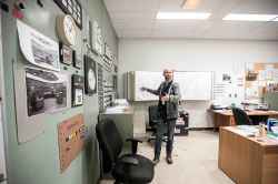 Jeff Miller shows what is left of the control room in the WR-1 reactor building.