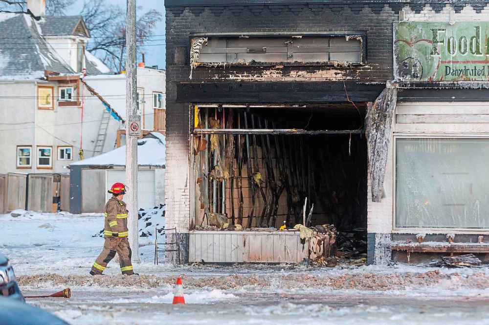 MIKE DEAL / FREE PRESSThe cause of the fire at 943 Portage Ave. is under investigation.