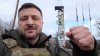 In this grab from a video provided by the Press Service Of The President Of Ukraine on Friday, Dec 12, 2025, Ukraine's President Volodymyr Zelenskyy records a video at the road entering of Kupiansk, Ukraine. (Press Service Of The President Of Ukraine via AP)
