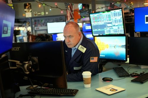 Derek Orth works on the floor at the New York Stock Exchange in New York, Wednesday, Dec. 10, 2025. (AP Photo/Seth Wenig)