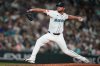 FILE - Seattle Mariners relief pitcher Caleb Ferguson throws against the San Diego Padres during the sixth inning of a baseball game Aug. 26, 2025, in Seattle. (AP Photo/Lindsey Wasson, File)