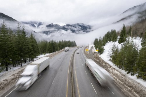 Vehicles drive along the Coquihalla Highway in B.C., on Wednesday, Jan. 19, 2022. THE CANADIAN PRESS/Jonathan Hayward