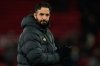 Manchester United's head coach Ruben Amorim walks on the pitch after the English Premier League soccer match between Manchester United and Wolverhampton Wanderers in Manchester, England, Tuesday, Dec. 30, 2025. (AP Photo/Dave Thompson)