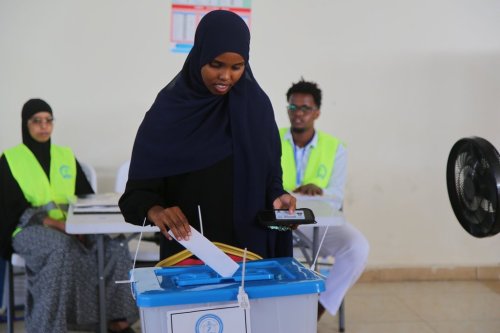 A woman casts her vote during the local election in Mogadishu, Somalia, Thursday, Dec. 25, 2025. (AP Photo/Farah Abdi Warsameh)