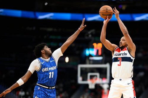 Washington Wizards guard CJ McCollum (3) shoots against Orlando Magic guard Jase Richardson (11) Washington Wizards guard CJ McCollum (3) during the first half of an NBA basketball game, Tuesday, Jan. 6, 2026, in Washington. (AP Photo/Nick Wass)