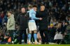 Manchester City's head coach Pep Guardiola, right, Josko Gvardiol after being substituted during the English Premier League soccer match between Manchester City and Chelsea in Manchester, England, Sunday, Jan. 4, 2026. (AP Photo/Dave Thompson)