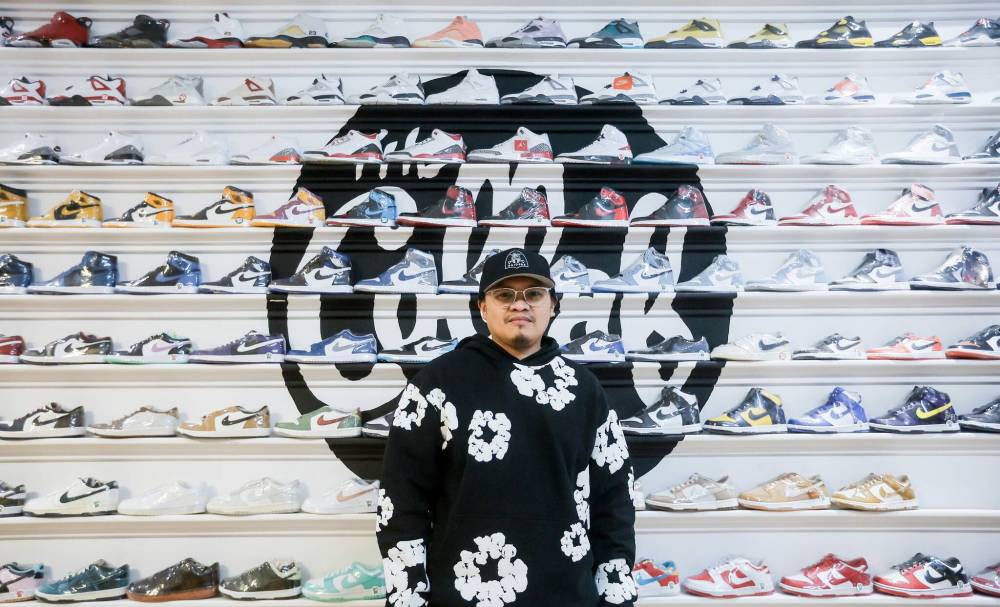 JOHN WOODS / FREE PRESS
                                ‘They (the BIZ) do a great job of trying to bring in more retail traffic into downtown. For us to participate, it just helps us as a small business,’ says Rodney Francisco, co-owner of the Collab Shop at 246 McDermot Ave.