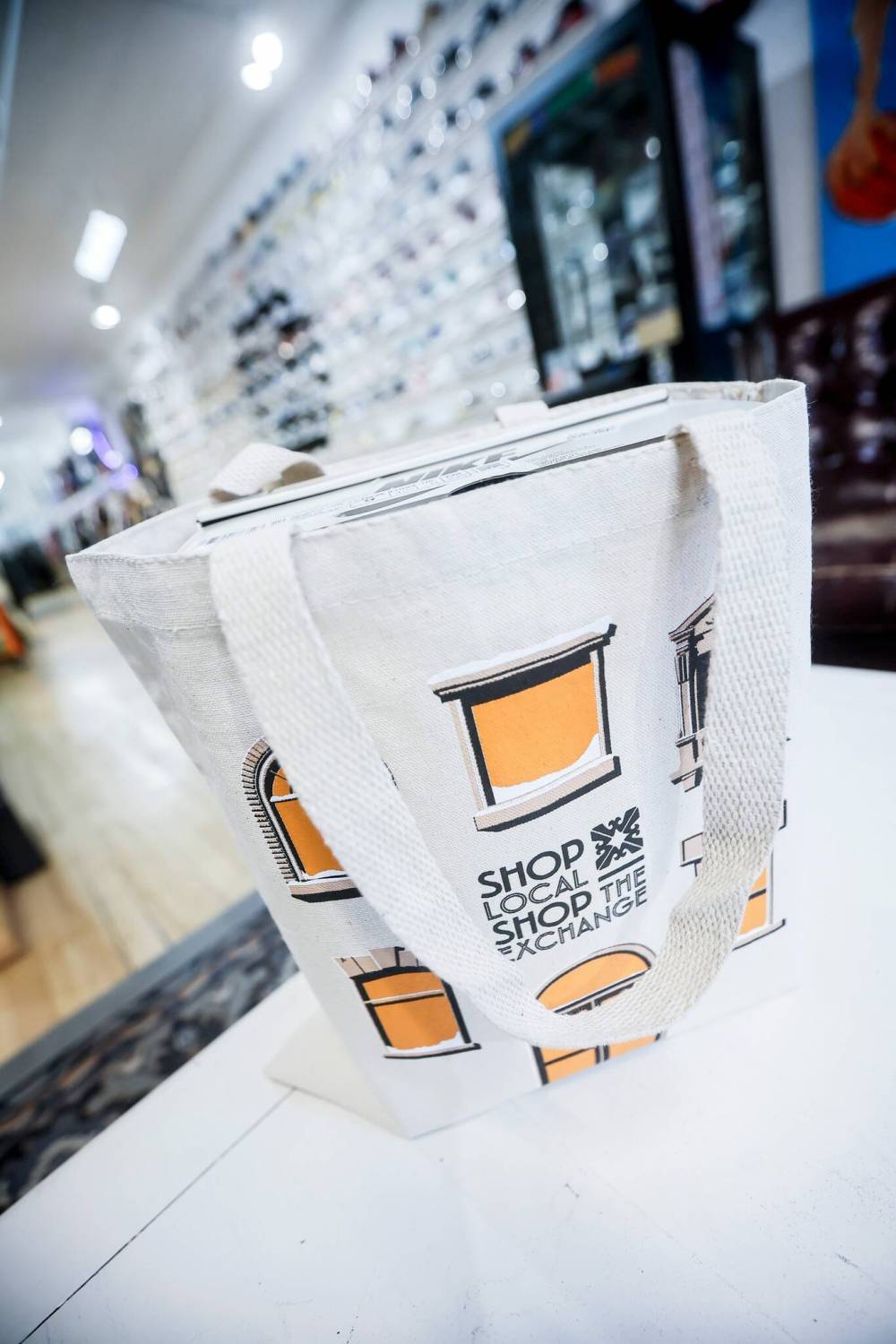 JOHN WOODS / WINNIPEG FREE PRESS
                                The Exchange District BIZ special tote bag for ‘Shop Local, Shop the Exchange’ campaign customers. Some 40 businesses and services are participating this year.