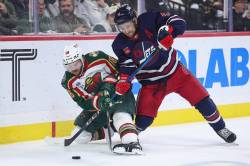 Matt Krohn / THE ASSOCIATED PRESS FILES
                                Winnipeg Jets defenceman Neal Pionk (right) was injured Nov. 23 against the Minnesota Wild, leaving in the first period with a lower-body injury.