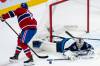 Christopher Katsarov / THE CANADIAN PRESS
                                Winnipeg Jets goaltender Eric Comrie (1) makes a save on Montreal Canadiens’ Jake Evans (71) during first period NHL hockey action in Montreal on Wednesday,