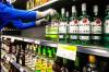 MIKAELA MACKENZIE / FREE PRESS FILES
                                An employee takes American alcohol off of the shelves at Manitoba Liquor Mart in March. The province pulled American booze as a tariff retaliation measure.