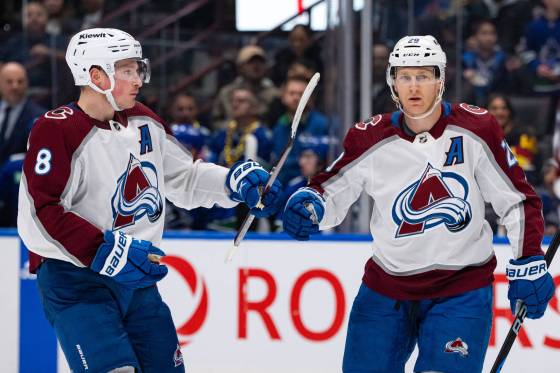 The Colorado Avalanche's Nathan MacKinnon (right) and teammate Cale Makar. (Ethan Cairns / The Canadian Press files)
