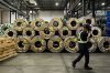 Stainless steel coils wait to be pressed into sheets in Montreal on Thursday, Sept. 18, 2025. THE CANADIAN PRESS/Christopher Katsarov