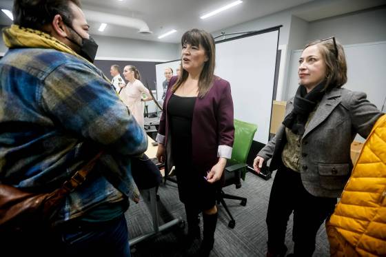 Housing, addictions and homelessness minister Bernadette Smith, centre, meets community members after a proposed supervised consumption site open house meeting at Siloam Mission, Tuesday. (John Woods / Free Press)