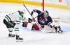 Fred Greenslade / THE CANADIAN PRESS
                                Jets’ goalie Eric Comrie makes a save on the Stars’ Sam Steel during first-period action Tuesday night in Winnipeg,