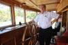 MIKE DEAL / FREE PRESS FILES
                                Capt. Steve Hawchuk stands on the bridge of the Paddlewheel Queen before setting off on the Red River in 2013, the last year it sailed.