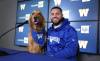 Ruth Bonneville / Free Press
                                Winnipeg Blue Bombers running back Brady Oliveira after signing a three-year contract extension through the 2028 Canadian Football League season at the media conference Tuesday with Gunnar, his 6-year-old Golden Retriever, one of his 3 dogs, who joined him behind the podium during the press conference at the Princess Auto Stadium.