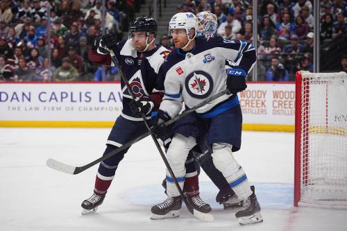 David Zalubowski / The Associated Press
                                Colorado Avalanche defenceman Devon Toews, left, covers Winnipeg Jets&rsquo; Gabriel Vilardi, front right, who sets up in front of Avalanche goaltender Scott Wedgewood, back right, in the second period Friday, in Denver.