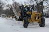 CHRIS KITCHING / FREE PRESS
                                City of Winnipeg crews plowed some residential streets in Charleswood on Monday as the cleanup from last week&rsquo;s storm continued.