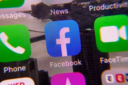 Richard Drew / The Associated Press files
                                The Facebook app is shown on a mobile phone screen.
