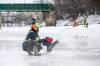 MIKAELA MACKENZIE / FREE PRESS
                                Kelsey Heide runs a pump as part of a crew flooding the Nestawaya river trail at The Forks on Monday.