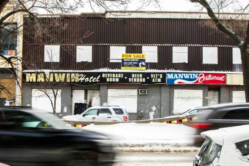 MIKAELA MACKENZIE / FREE PRESS
                                The now-vacant Manwin Hotel on Main Street was briefly listed for sale earlier this year.