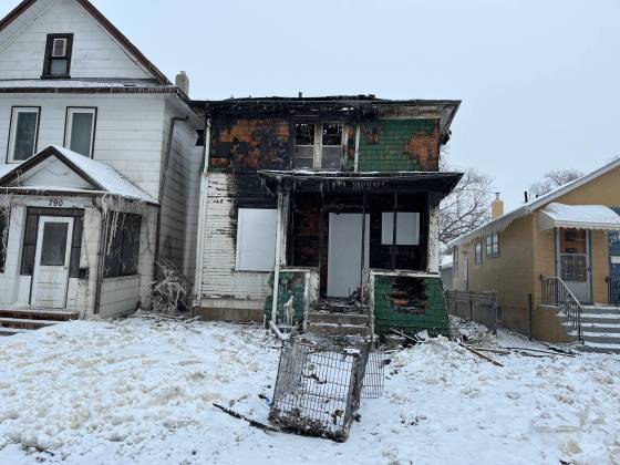 One person is dead and three others were treated in hospital after a house fire at 792 Nassau St. (Malak Abas / Free Press)