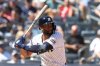 FILE - New York Yankees' Amed Rosario bats during the fourth inning of a baseball game against the Boston Red Sox Aug. 23, 2025, in New York. (AP Photo/Pamela Smith, File)