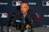 Dave Roberts, manager of the Los Angeles Dodgers, answers questions during a news conference at the MLB winter meetings, Monday, Dec. 8, 2025, in Orlando, Fla. (AP Photo/John Raoux)