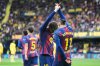 Barcelona's Raphinha, back, celebrates with his teammate Barcelona's Lamine Yamal after scoring the opening goal from a penalty kick during the Spanish La Liga soccer match between Villarreal and Barcelona in Villarreal, Spain, Sunday, Dec. 21, 2025. (AP Photo/Alberto Saiz)