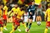 FILE - Lens' Odsonne Edouard kicks the ball during the French League One soccer match between Lens and Marseille in Lens, France, Saturday, Oct. 25, 2025. (AP Photo/Jean-Francois Badias, File)