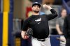FILE - Tampa Bay Rays pitcher Shane McClanahan throws in the bullpen before a baseball game between the Rays and the Baltimore Orioles Aug. 10, 2024, in St. Petersburg, Fla. (AP Photo/Chris O'Meara, File)