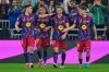 Barcelona players celebrate after scoring the second goal during the Spanish Super Cup semifinal soccer match against Athletic Club Bilbao at King Abdullah Sports City Stadium in Jeddah, Saudi Arabia, Wednesday, Jan. 7, 2026. (AP Photo/Altaf Qadri)