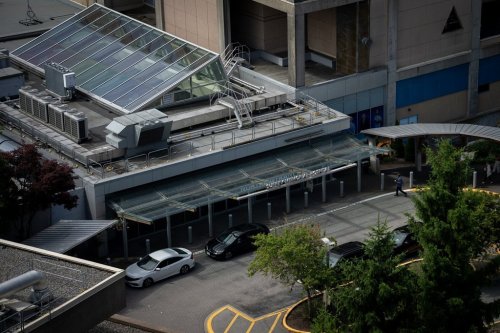 An entrance to Surrey Memorial Hospital is pictured from a roof top in Surrey, B.C., Wednesday, June 26, 2024. THE CANADIAN PRESS/Ethan Cairns