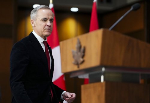 Prime Minister Mark Carney arrives to take part in an announcement with Ontario Premier Doug Ford on Parliament Hill in Ottawa on Thursday, Dec. 18, 2025. THE CANADIAN PRESS/Sean Kilpatrick